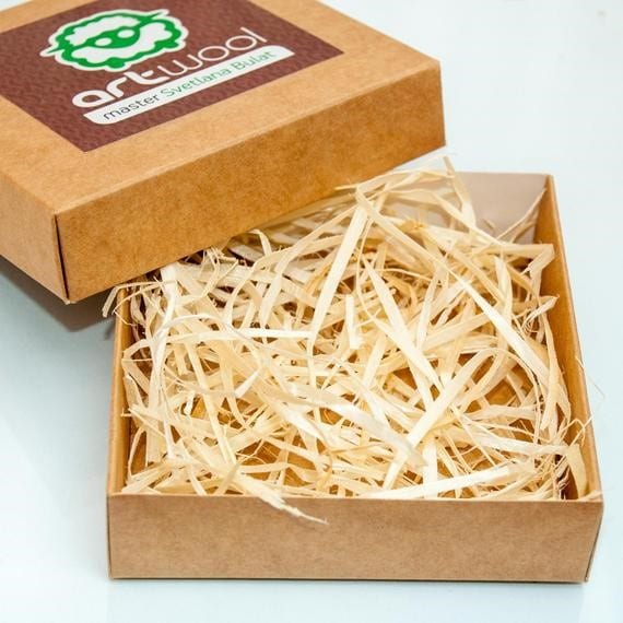 An example of using wood wool in decorative packaging. Source: Etsy.com 